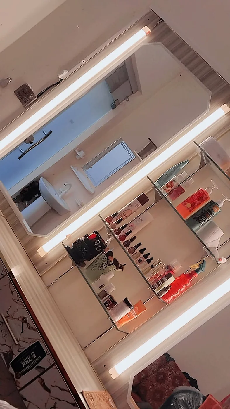 Styling stations with mirrors inside Glow Beauty Salon Kasur